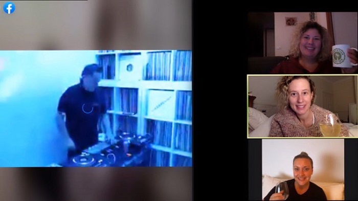 Screen shot of a computer showing a DJ and three friends watching from separate