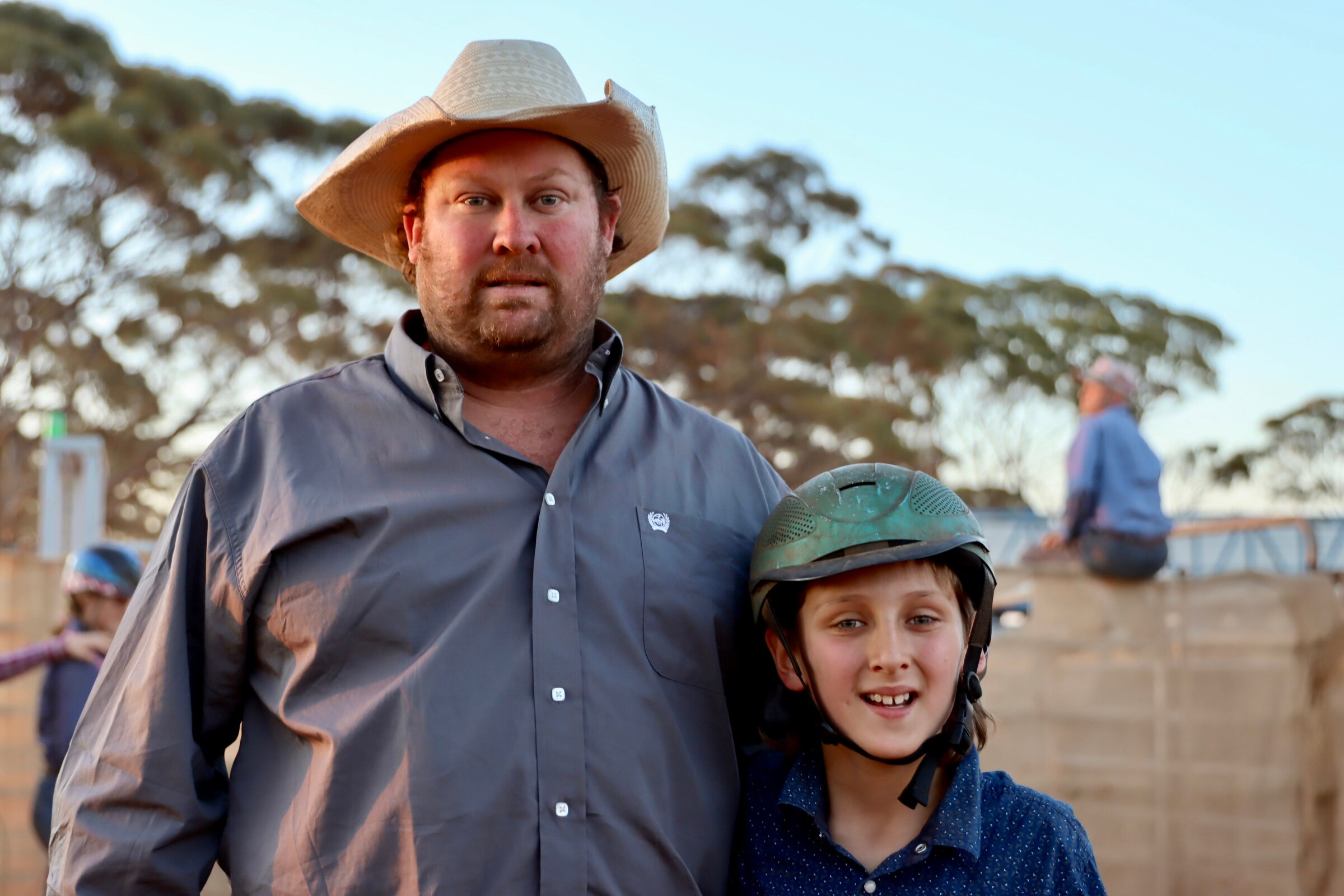 father and son at a rodeo