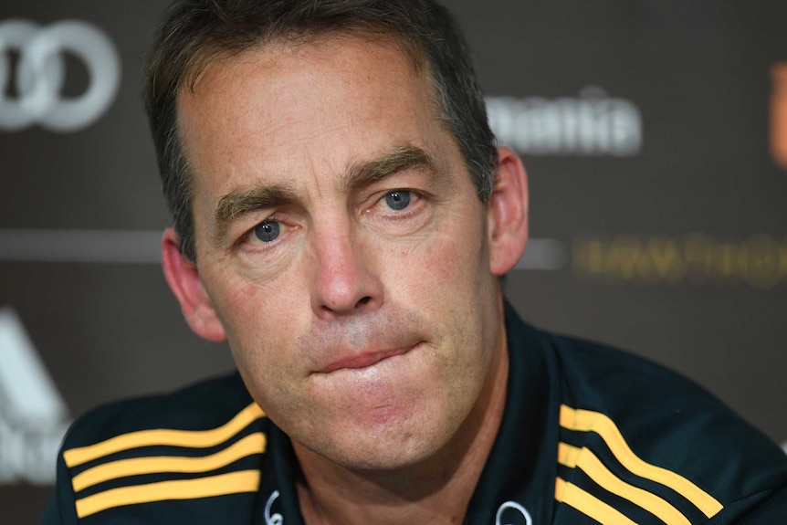 Alastair Clarkson speaks at a press conference