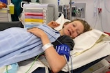 A photo of Gove 13-year-old Indi Young lying in a hospital bed after being stung by an Irukandji.