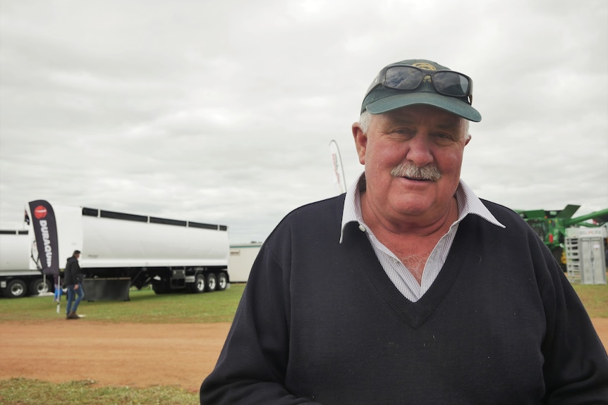 Man standing near truck