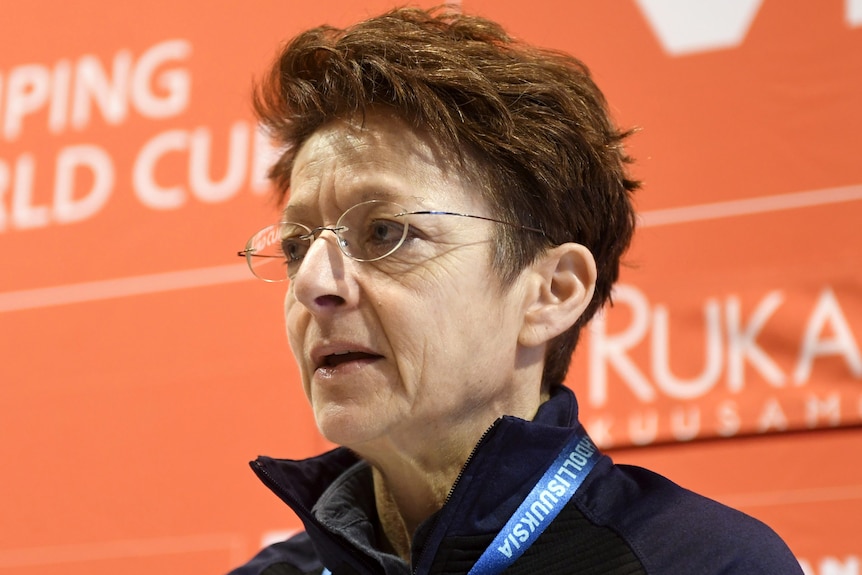 A sporting administrator speaks at a media conference in Finland.
