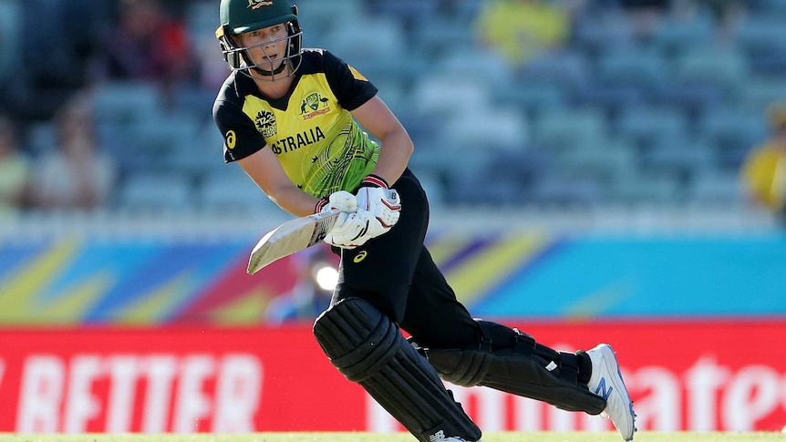 Meg Lanning sets off on a run wearing cricket kit