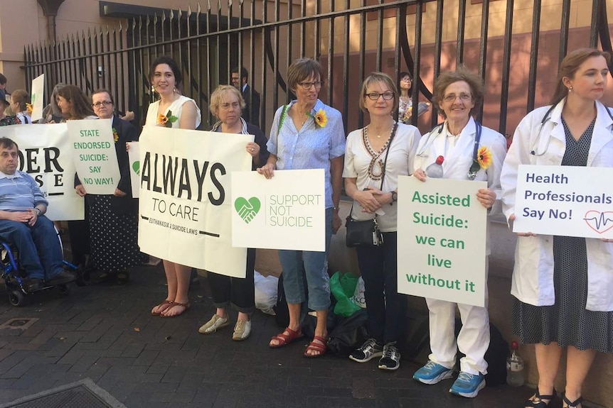 A group of protesters with sings.