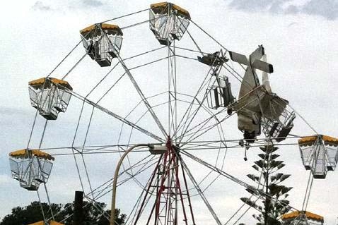 A light plane crashed into a ferris wheel at a festival in Taree, in New South Wales, on October 1, 2011.
