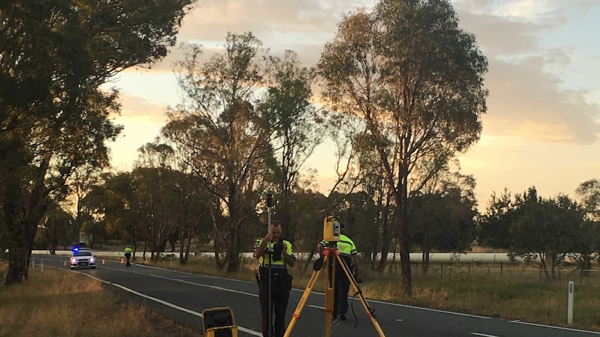 Police at the scene of a motorcycle fatality at Mount Stromlo on the Cotter Road.
