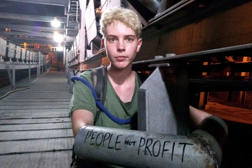 Anti-Adani protester Tess Newport chained to the Abbot Point Port