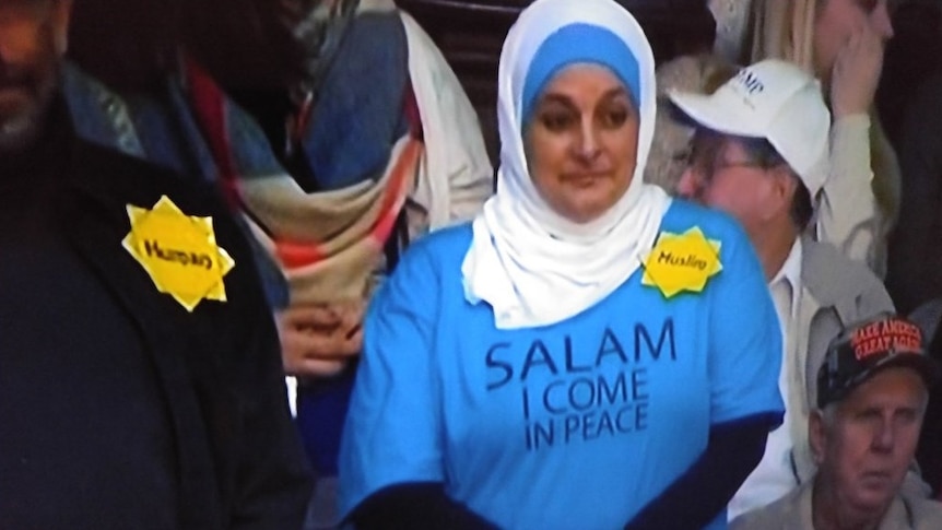 A Muslim woman attends a rally.