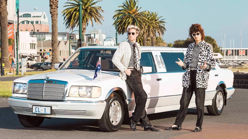 A 2016 press shot of Client Liaison standing in front of their Off White Limousine
