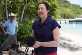 Annastacia Palaszczuk laughs while campaigning on Fitzroy Island, off Cairns.