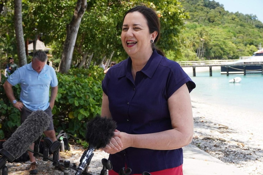 Annastacia Palaszczuk laughs while campaigning on Fitzroy Island, off Cairns.