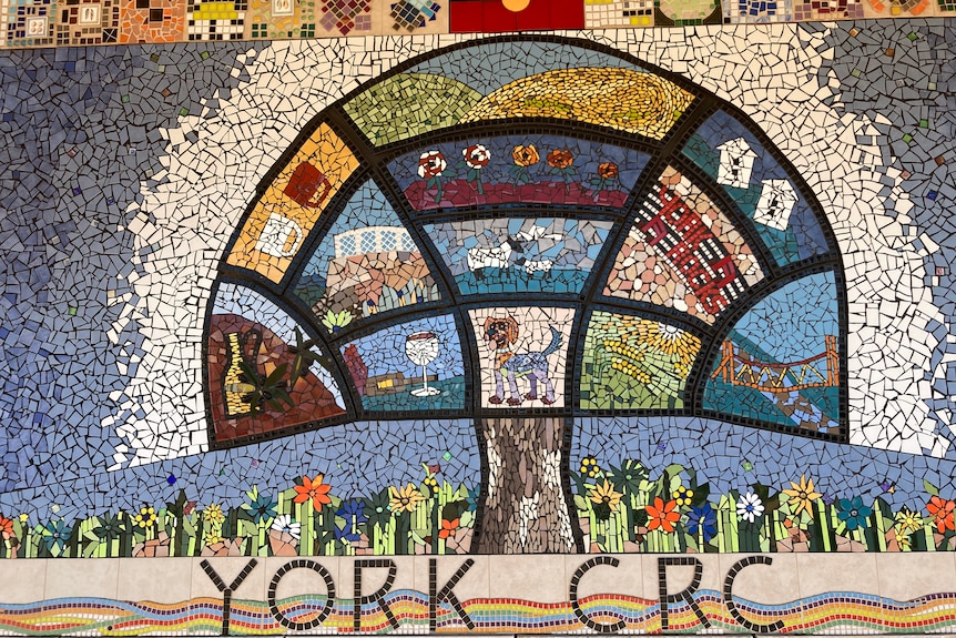 A mosaic of a tree with the title York CRC underneath.
