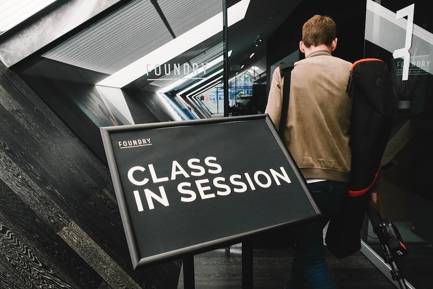 Class In Session sign in walkway of Foundry's Hobart campus.
