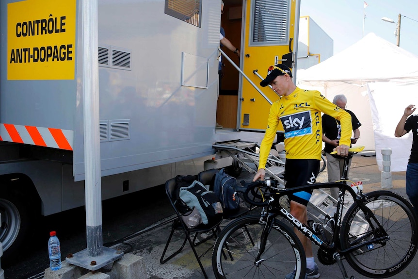 Christopher Froome arrives at the anti-doping control bus.
