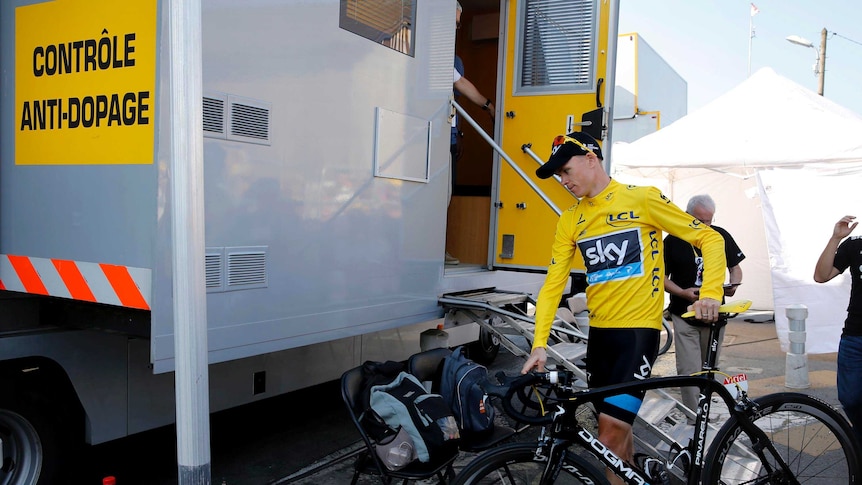 Christopher Froome arrives at the anti-doping control bus.