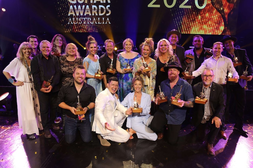 All the Golden Guitar winners gather on stage for a  photo