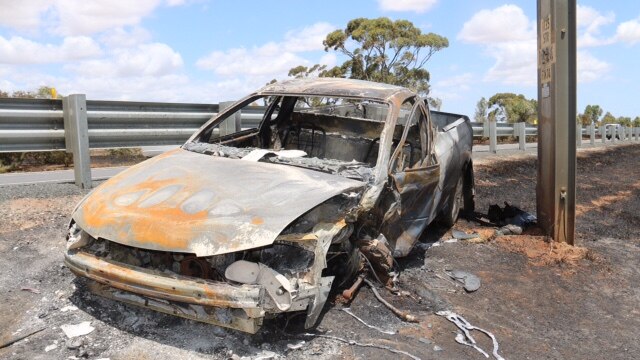 A burnt out car on the Sturt Highway