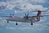 A QantasLink plane in the air