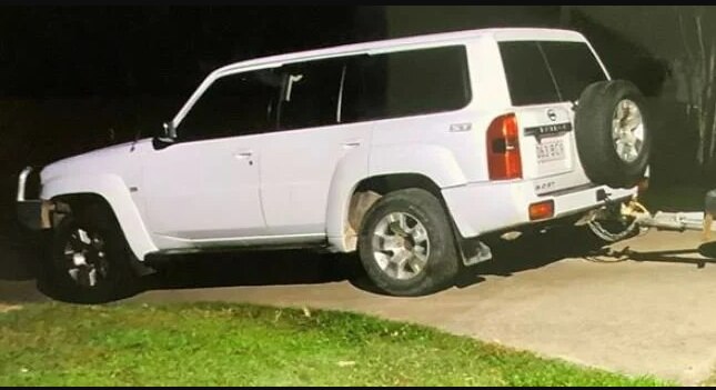 A white four-wheel drive with the registration 063BC9.