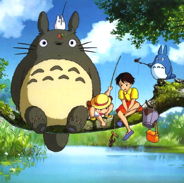 Totoro sits on a branch above a stream fishing with other characters