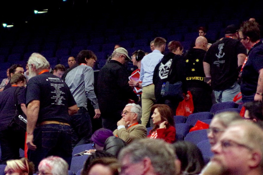 Delegates walking out of the ALP state conference.