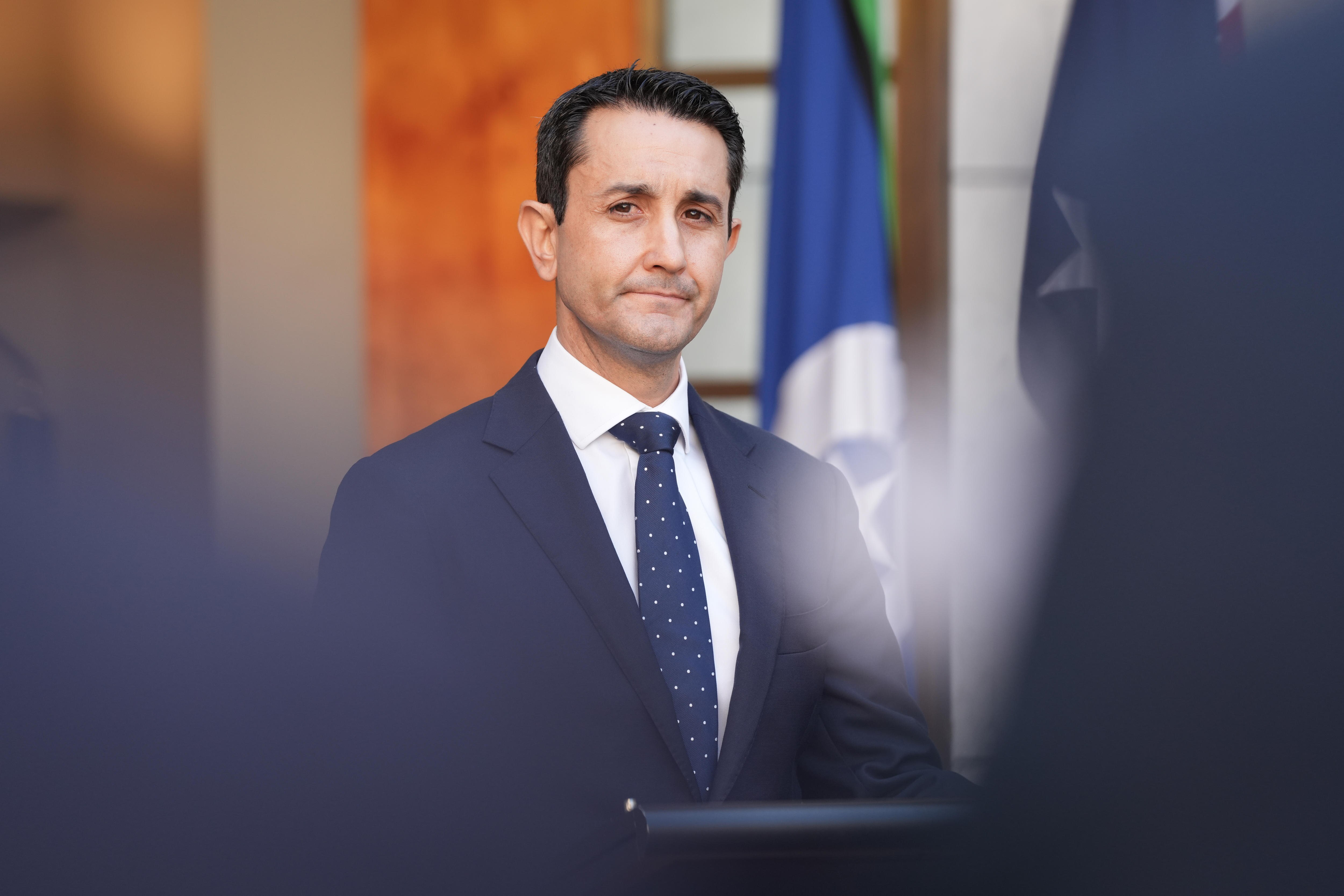 David Crisafulli looks towards camera with a neutral facial expression.