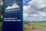 A sign in front of a private school called Tenison Woods College.