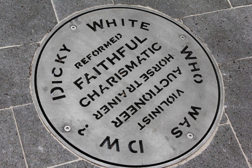 A plaque on the ground in Dicky Whites Lane in the centre of Launceston.