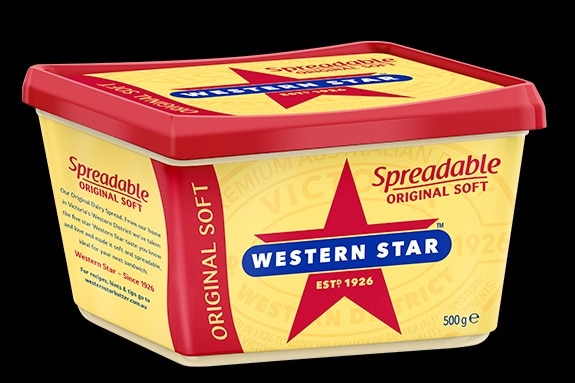 a yellow and reed butter container of the Western Star brand