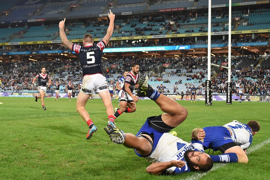 Roosters' Shaun Kenny-Dowall celebrates a try only for it later to be denied against the Bulldogs.