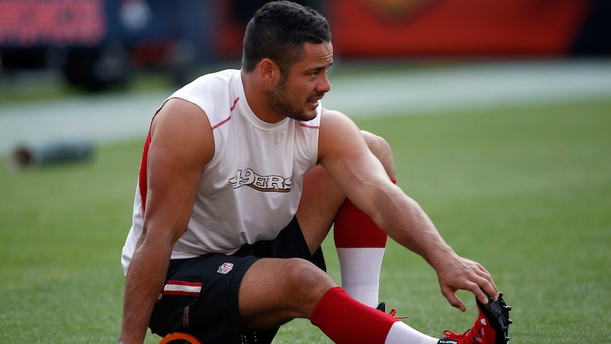 Jarryd Hayne warms up for San Francisco 49ers' NFL preseason game against Denver