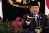 Indonesian President Susilo Bambang Yudhoyono gestures as he delivers a speech