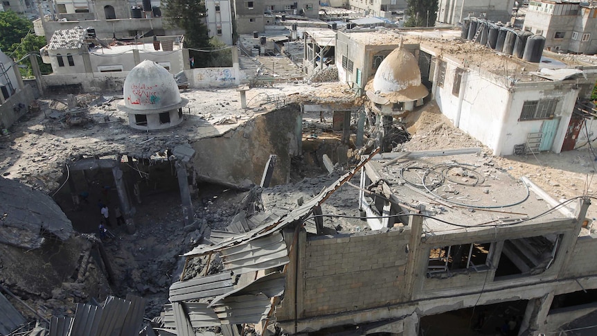 Remains of a mosque following an overnight Israeli military strike
