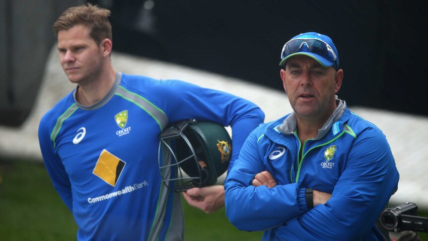 Captain Steve Smith (L) and coach Darren Lehmann look on at an Australian nets session in Hobart.