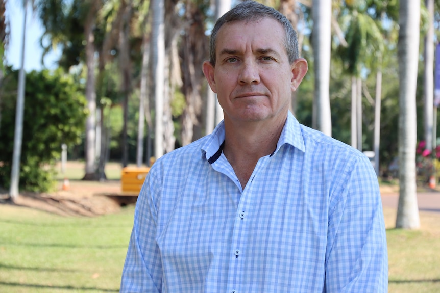 The Northern Territory deputy opposition leader Gerard Maley looks seriously at the camera. 