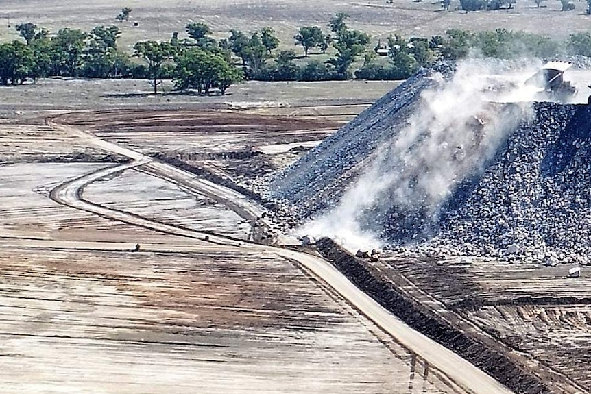 A photo of dust rising from the Maules Creek mining site.