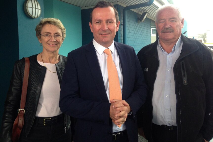 Labor MPs Sally Talbot, Mark McGowan and Mick Murray standing side by side smiling at the camera.