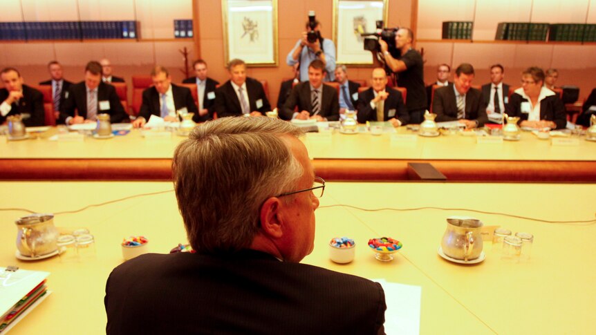 Federal Treasurer Wayne Swan looks on during a meeting with the state treasurers at Parliament House in Canberra.