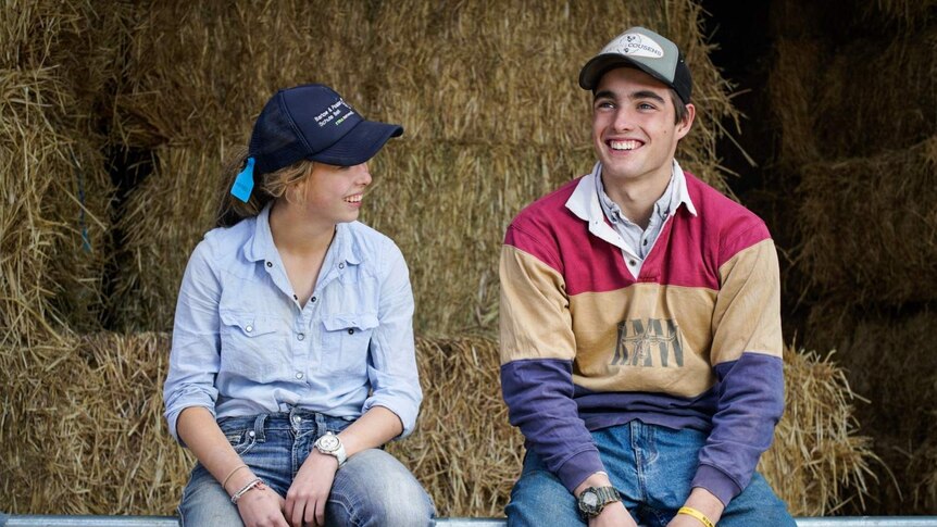 Siblings Walker and Caitlin Harrison are home to their family farm for the school holidays