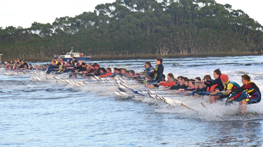 A group of water skiers attempt to break a world record in Strahan, Tasmania