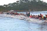 A group of water skiers attempt to break a world record in Strahan, Tasmania