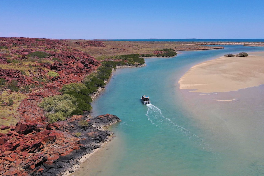 The DHSC team is pictured from the air in an area that was dry land just 8000 years ago.