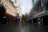 A wide shot of Hay Street mall empty on a rainy day.
