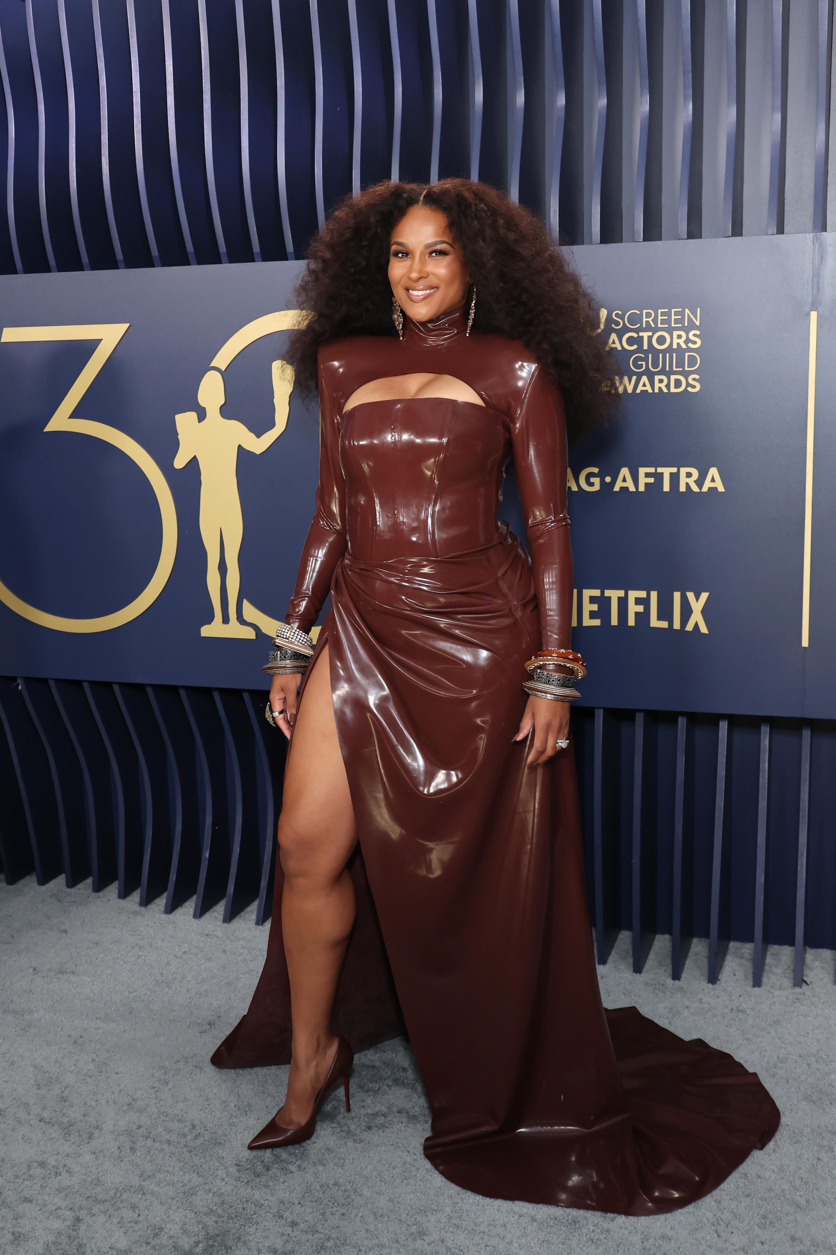 Woman in brown leather dress