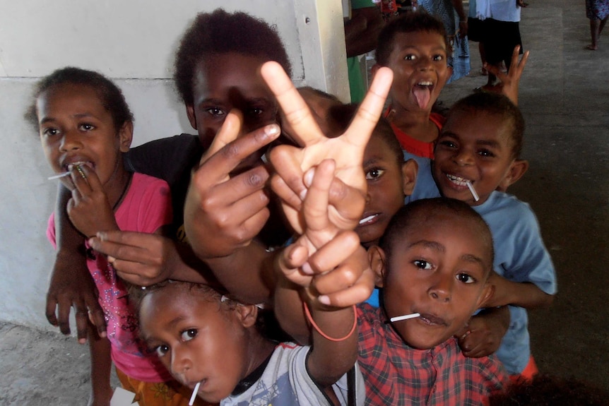 QCH children greet volunteers in vanuatu