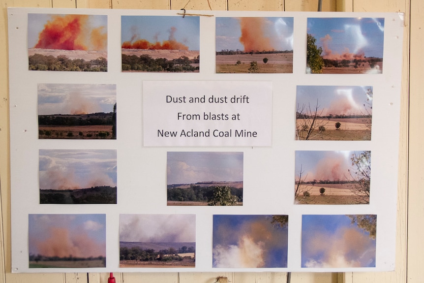 Photos on a board showing dust from the New Acland Coal mine taken by Aileen Harrison.