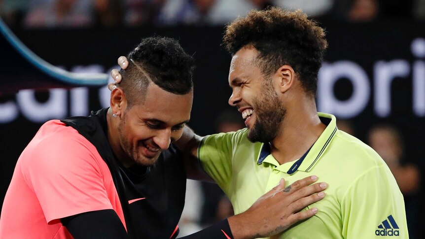 Nick Kyrgios and Jo Wilfried Tsonga embrace