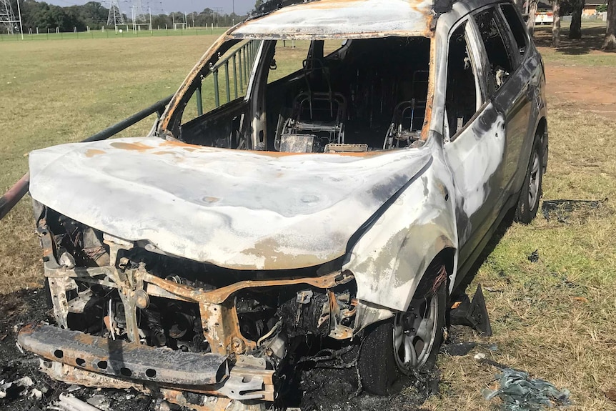 A burnt out SUV-like car
