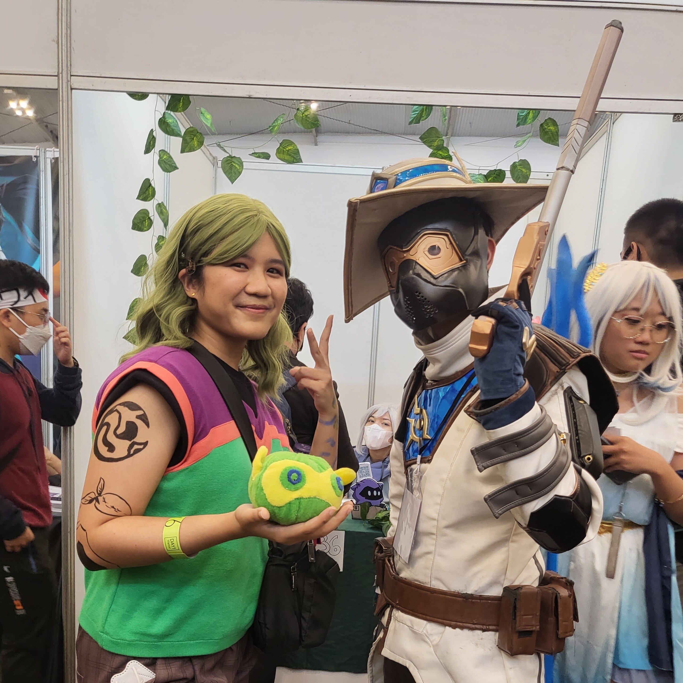 Two people wearing costumes from Japanese characters during cosplay party in Jakarta