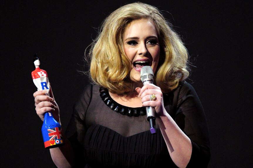 Adele accepts the British Female Solo Artist award at the BRIT Awards.